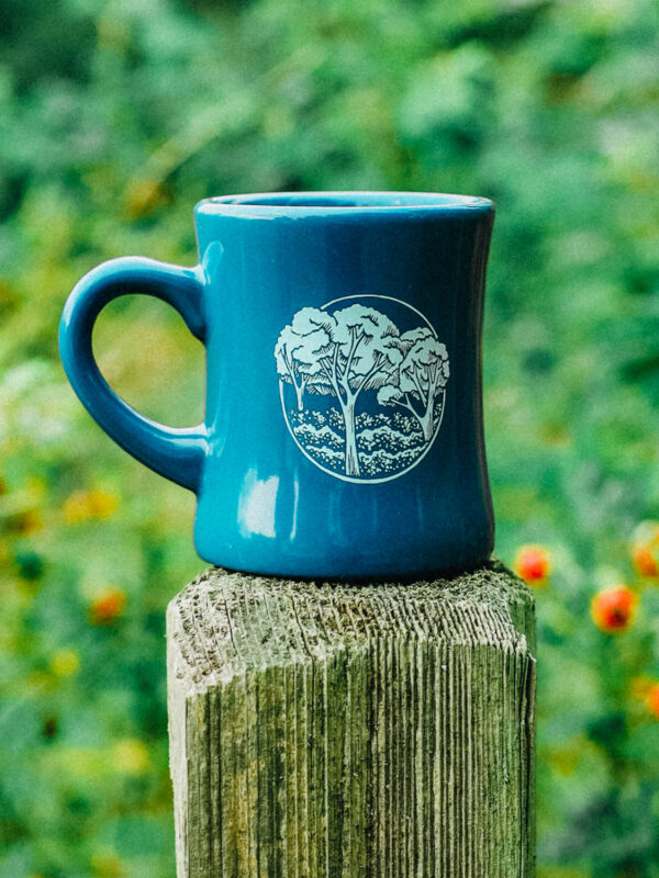 Blue Coffee Mug with Illustration of Trees